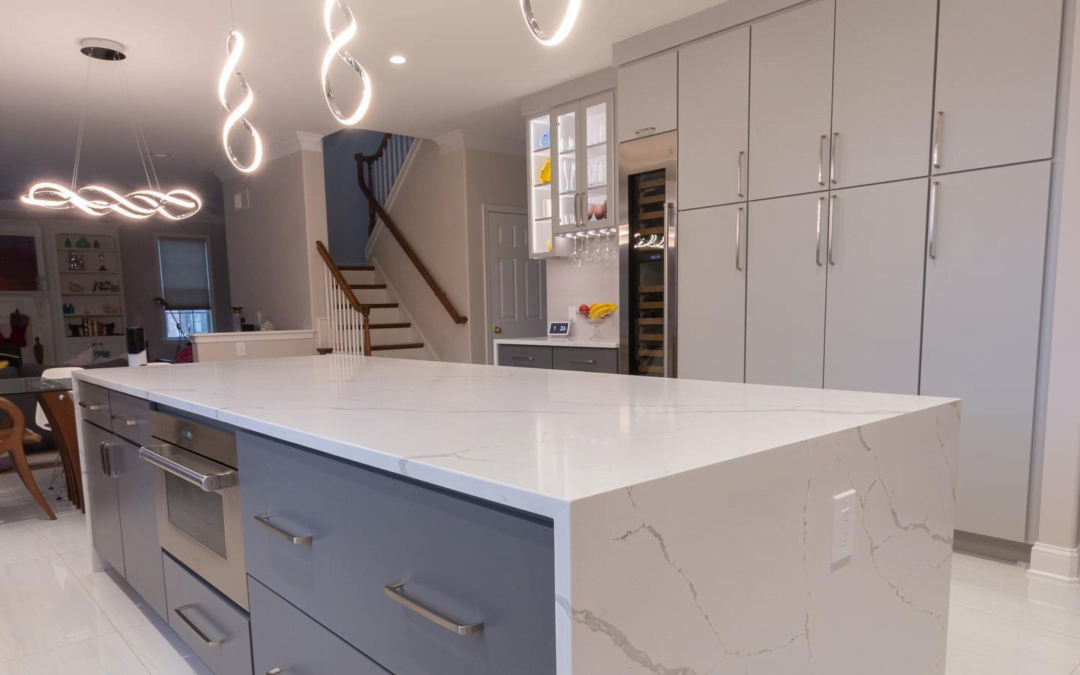 kitchen with marble island and ceiling cabinets